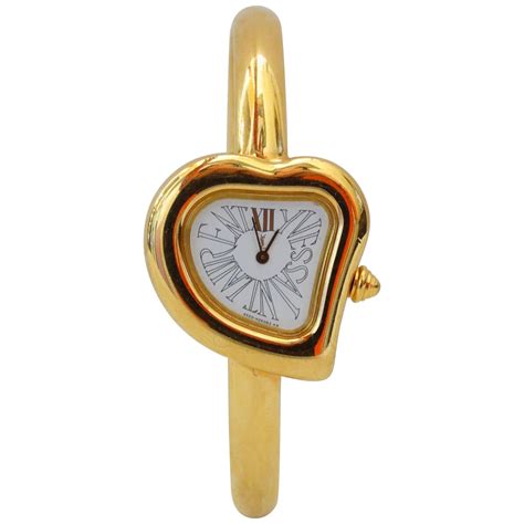 ysl heart shaped watch.